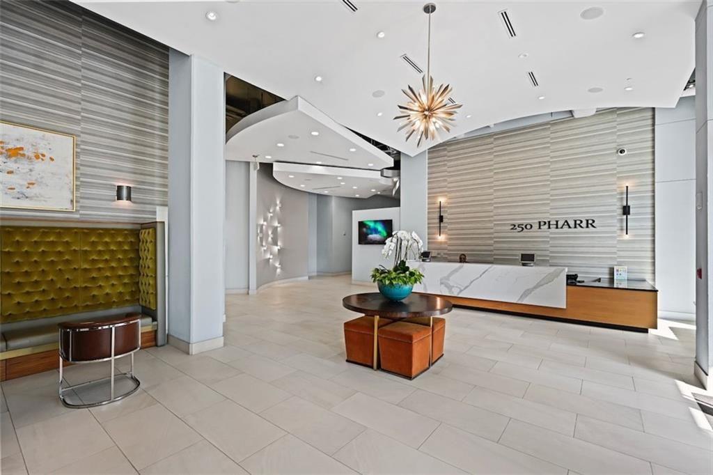 250 Pharr Road Northeast, Unit 602 Atlanta, GA 30305 - Photo 4 of 38 a outdoor space with plants