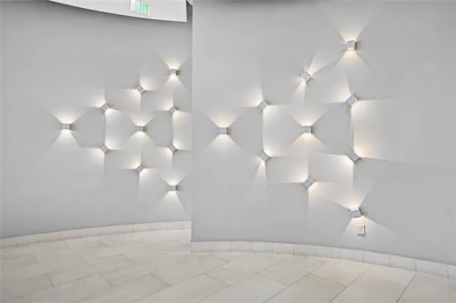 a view of a dining room with furniture wooden floor and chandelier