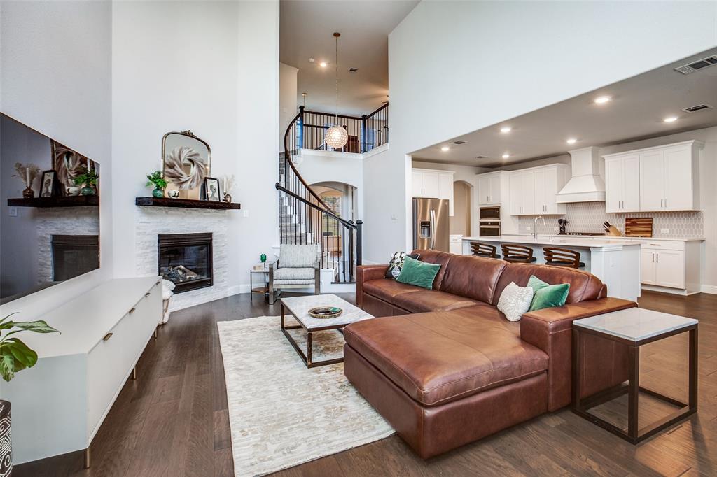 311 Suncrest Way Sunnyvale, TX 75182 - Photo 11 of 40 a living room with furniture and a fireplace