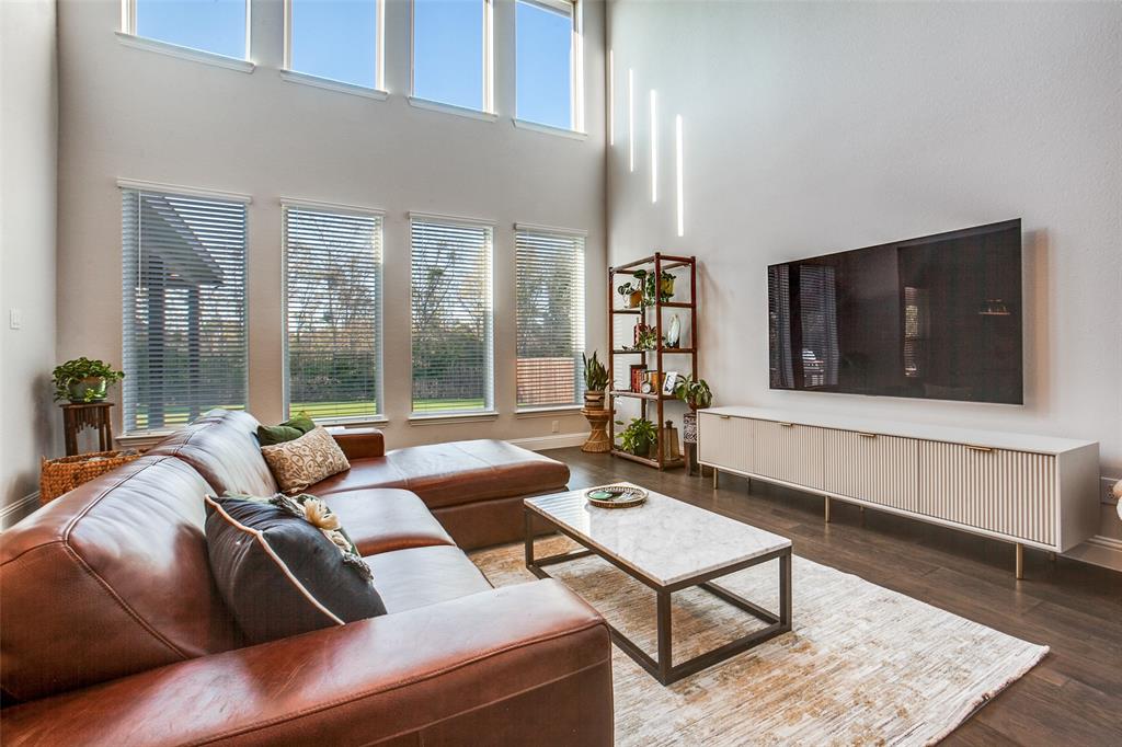 311 Suncrest Way Sunnyvale, TX 75182 - Photo 13 of 40 a living room with furniture and a flat screen tv