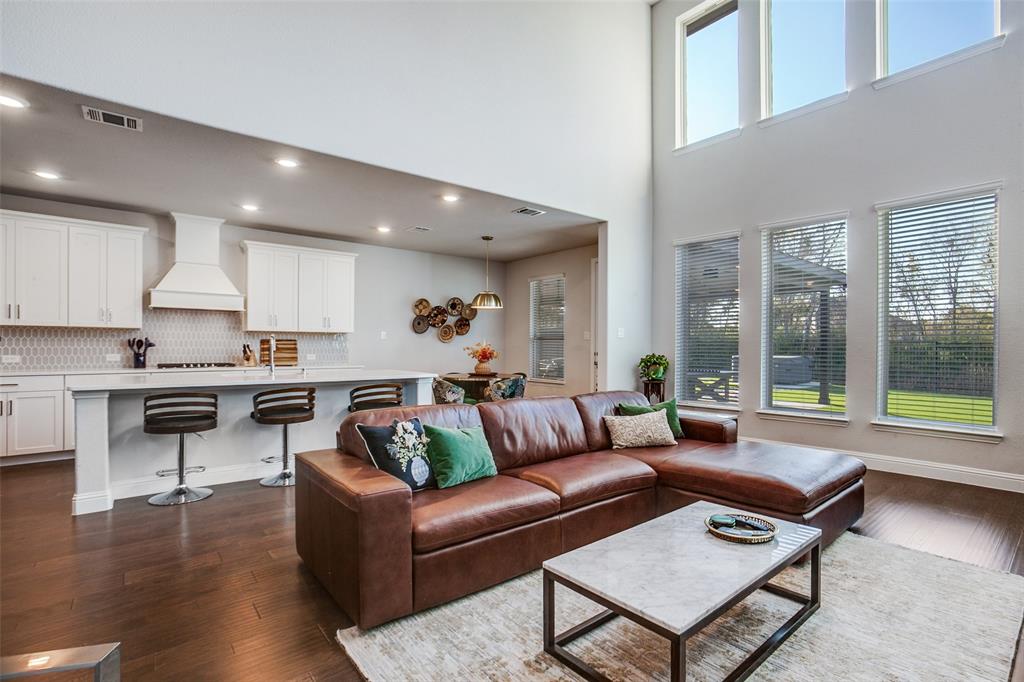 311 Suncrest Way Sunnyvale, TX 75182 - Photo 14 of 40 a living room with furniture and a wooden floor