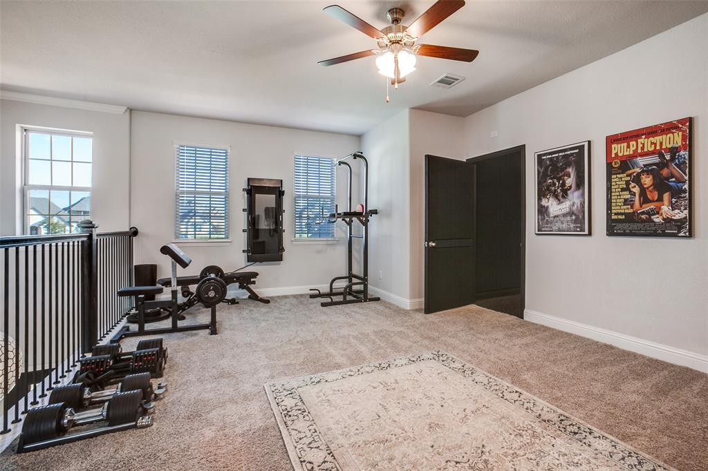 311 Suncrest Way Sunnyvale, TX 75182 - Photo 24 of 40 a living room with furniture