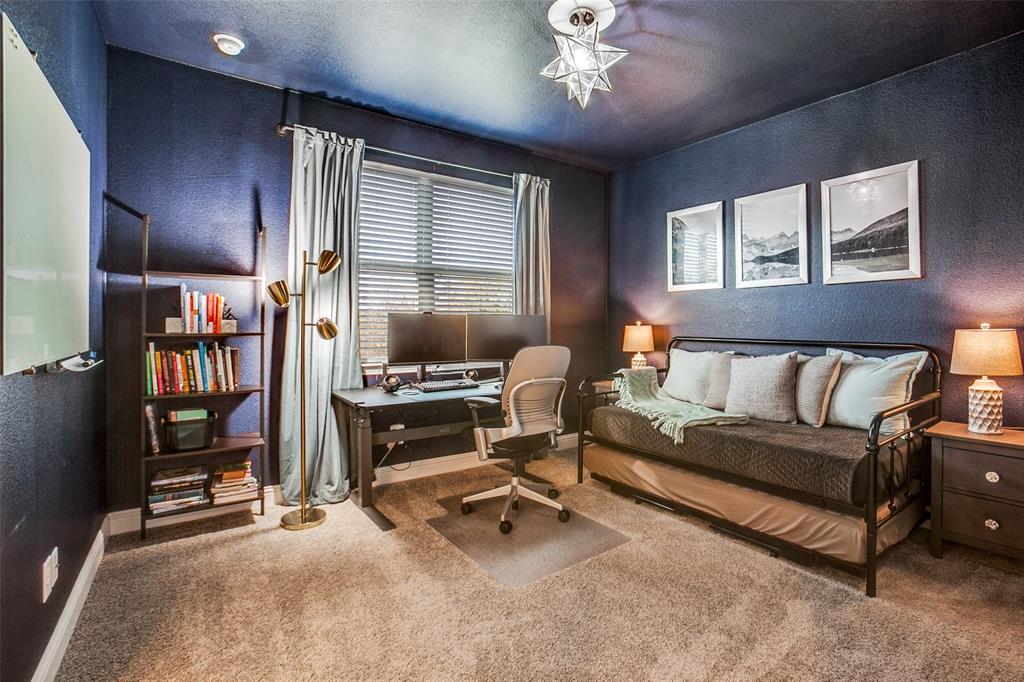 311 Suncrest Way Sunnyvale, TX 75182 - Photo 27 of 40 a livingroom with workspace couch and a window