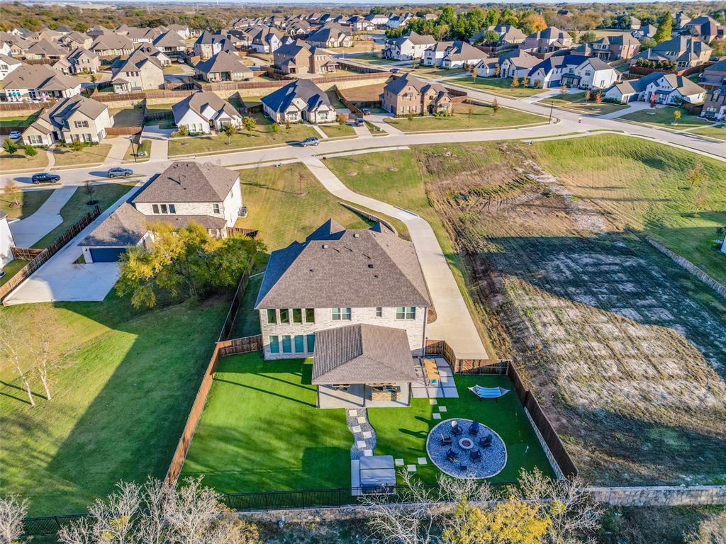 311 Suncrest Way Sunnyvale, TX 75182 - Photo 35 of 40 an aerial view of residential houses with outdoor space and swimming pool