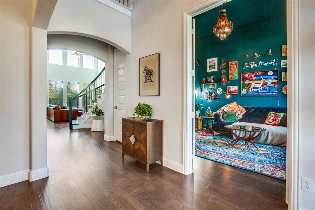 311 Suncrest Way Sunnyvale, TX 75182 - Photo 6 of 40 a living room with furniture stairs and a view of kitchen