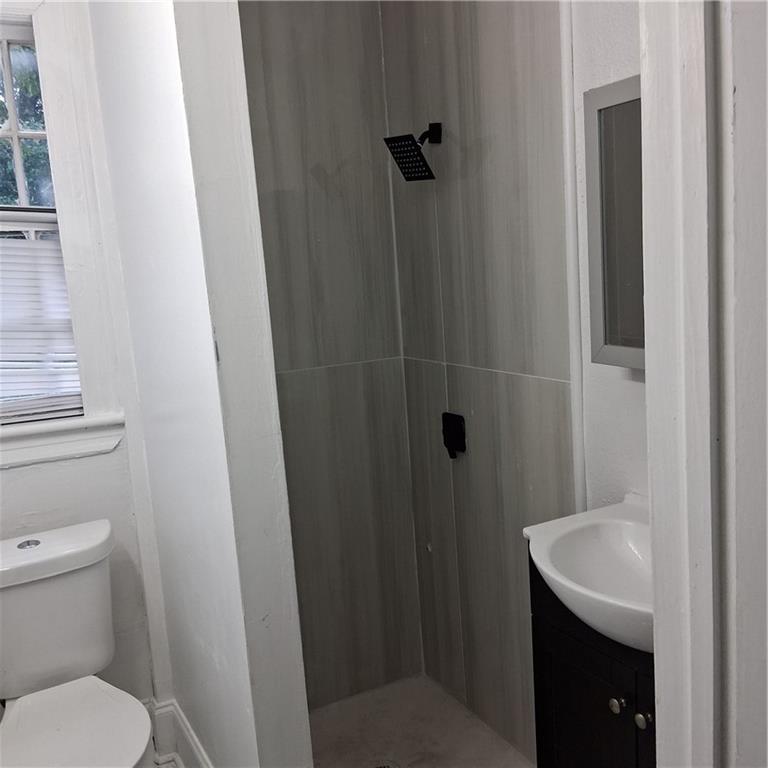 3435 Hillcrest Road Macon, GA 31204 - Photo 11 of 12 a bathroom with a sink and toilet