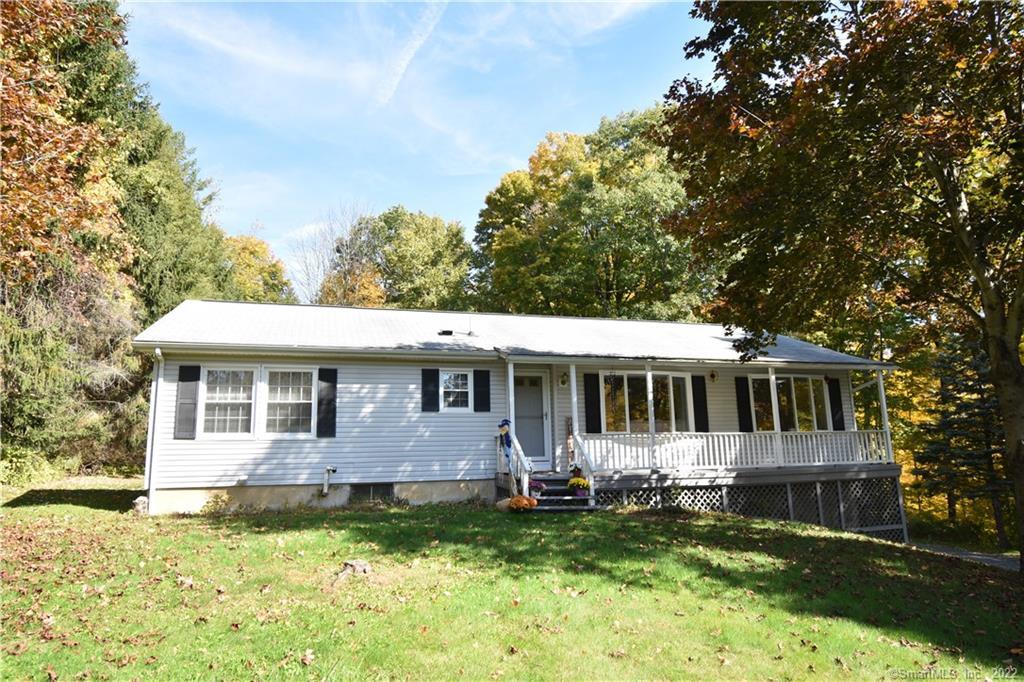 a view of a yard in front of house