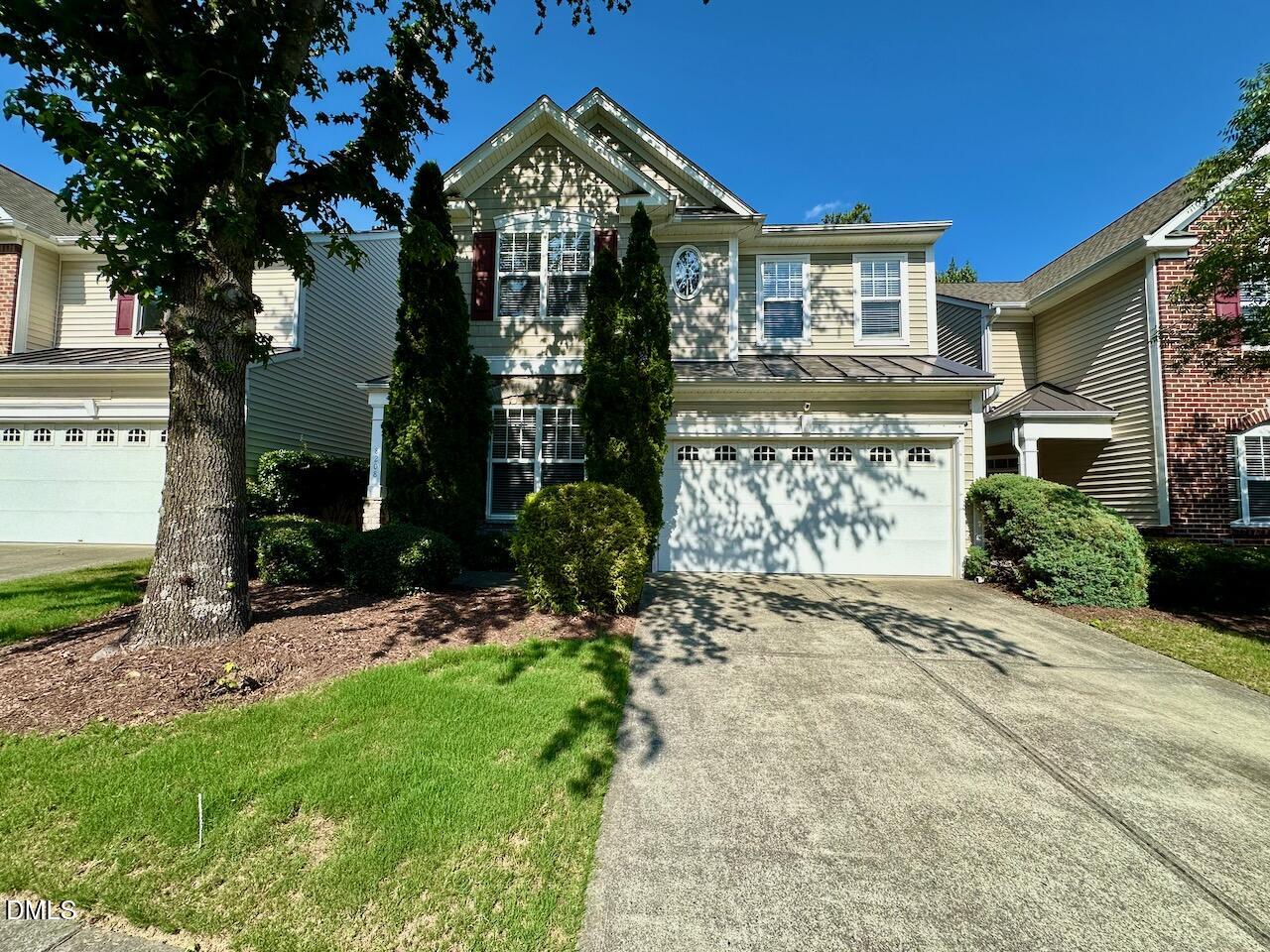 8208 Stone Cellar Drive Raleigh, NC 27613 - Photo 1 of 34 a view of a brick house with a yard
