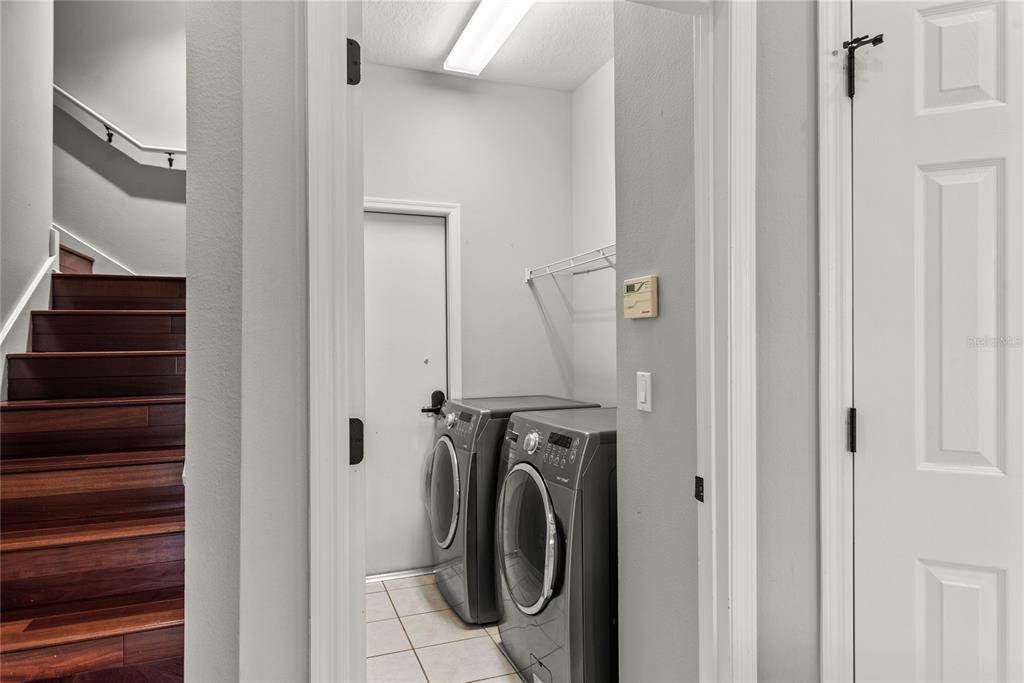 121 Figtree Run Longwood, FL 32750 - Photo 12 of 33 a utility room with dryer and washer