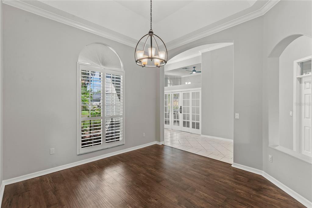 121 Figtree Run Longwood, FL 32750 - Photo 29 of 33 a view of wooden floor and windows in a room