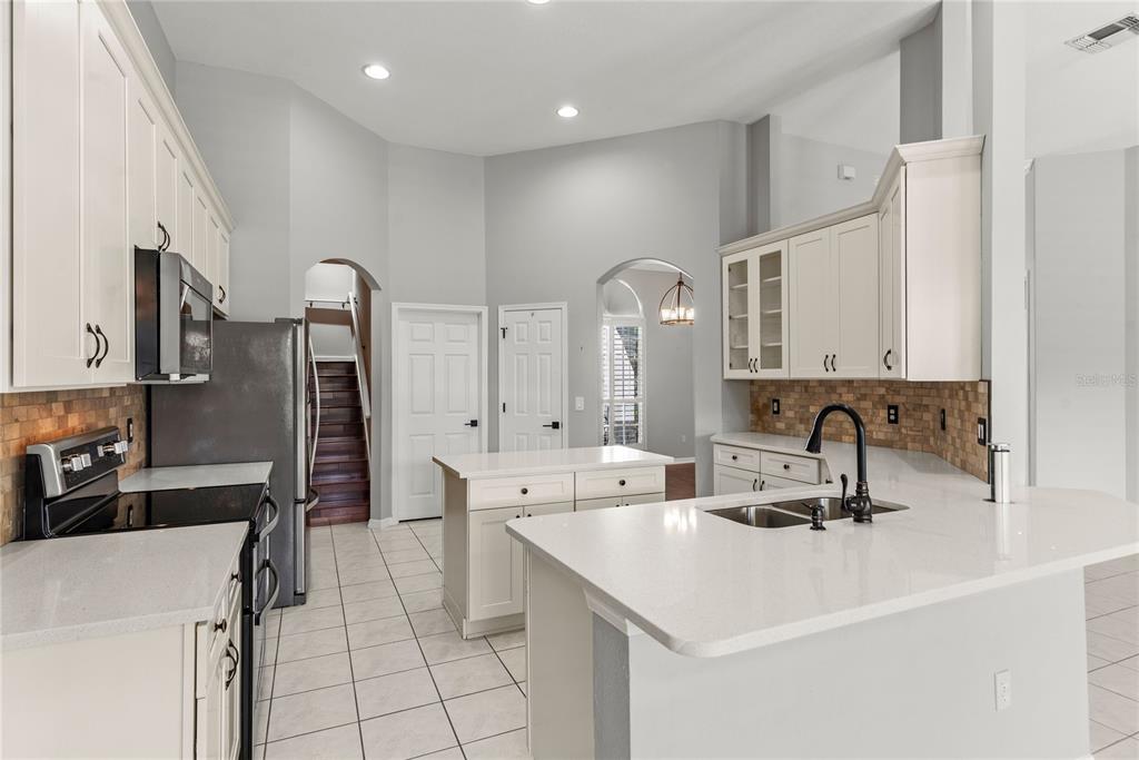121 Figtree Run Longwood, FL 32750 - Photo 7 of 33 a bathroom with a sink and a mirror