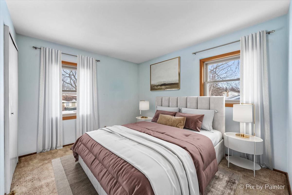 411 Krause Avenue Streamwood, IL 60107 - Photo 19 of 54 a bedroom with a bed and a window