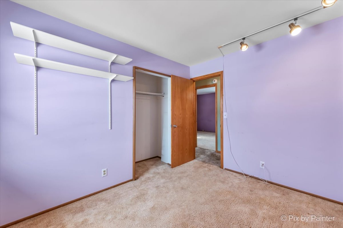 411 Krause Avenue Streamwood, IL 60107 - Photo 24 of 54 a view of a room with an empty space