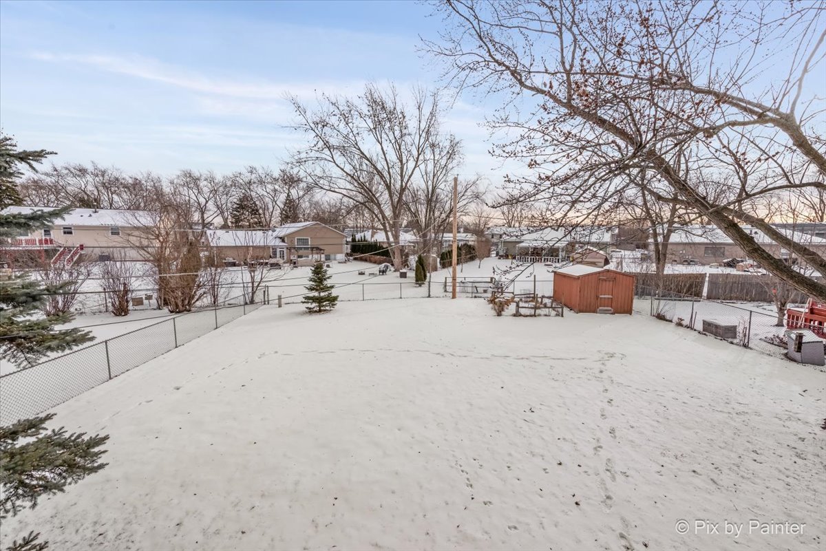 411 Krause Avenue Streamwood, IL 60107 - Photo 38 of 54 a view of road view with large trees