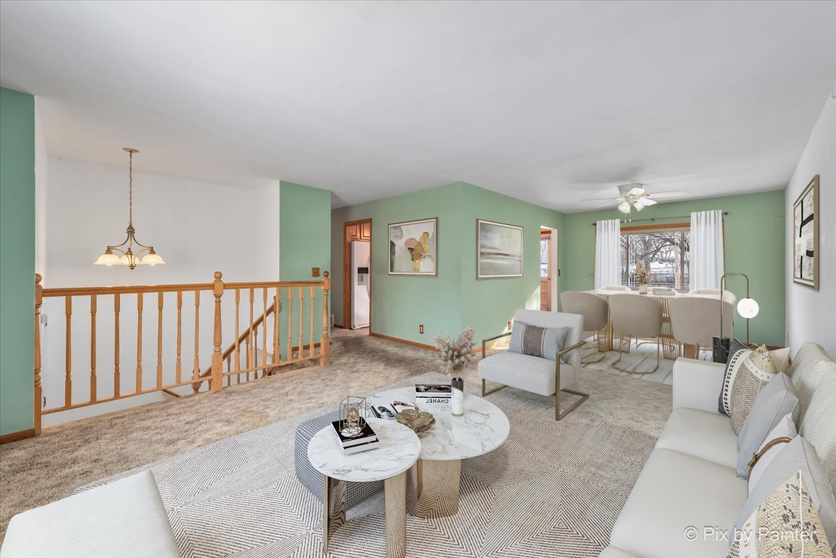 411 Krause Avenue Streamwood, IL 60107 - Photo 4 of 54 a living room with furniture and wooden floor