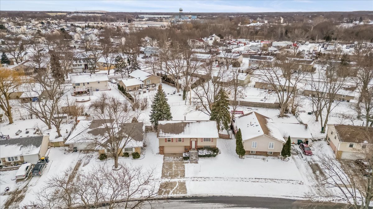 411 Krause Avenue Streamwood, IL 60107 - Photo 46 of 54 an aerial view of residential houses with city view