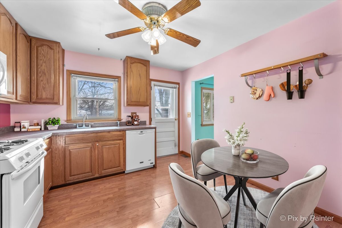 411 Krause Avenue Streamwood, IL 60107 - Photo 10 of 54 a kitchen with a table and chairs in it