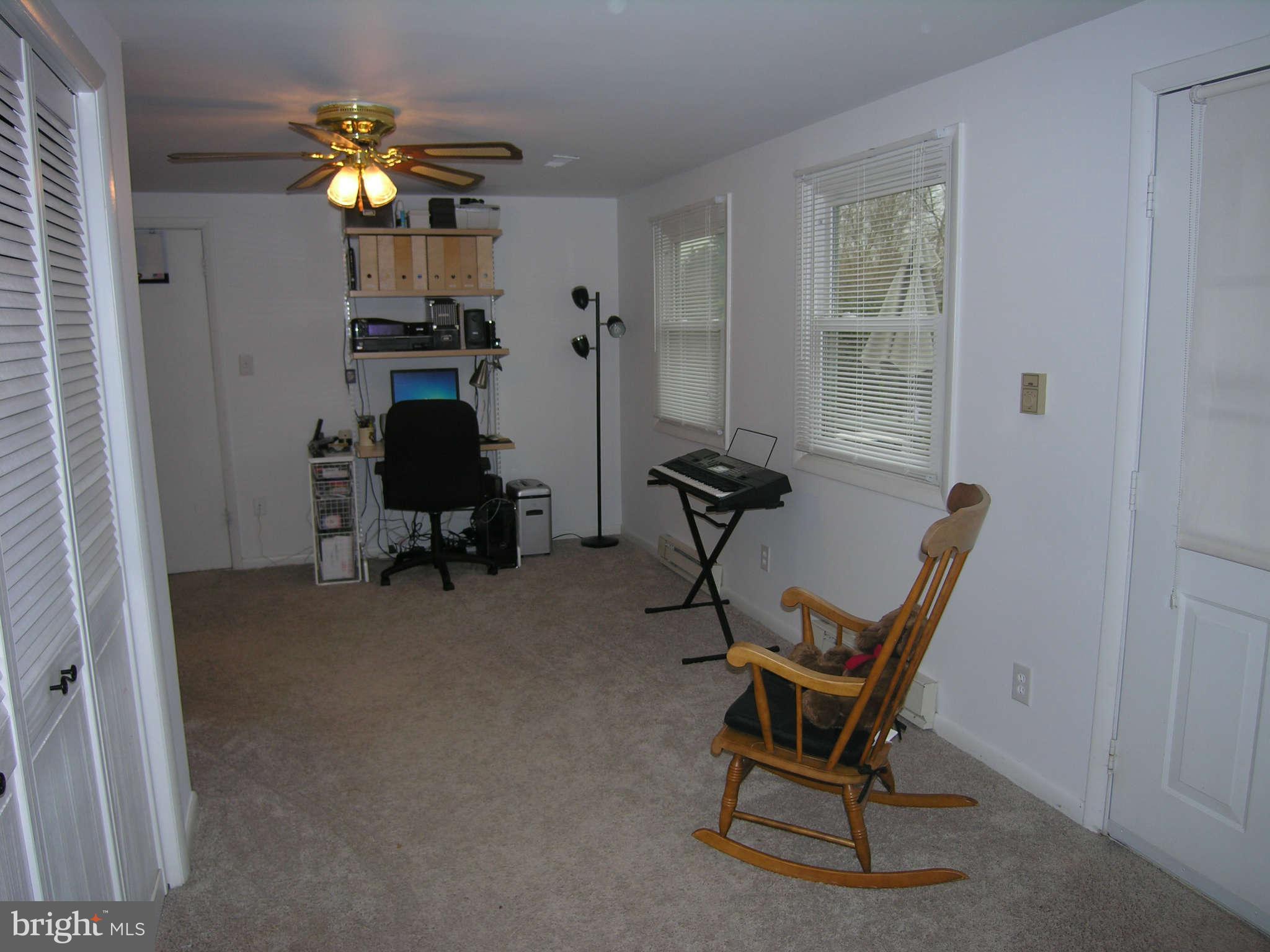 4111 Lees Corner Road Chantilly, VA 20151 - Photo 13 of 19 a view of a workspace with furniture and a window