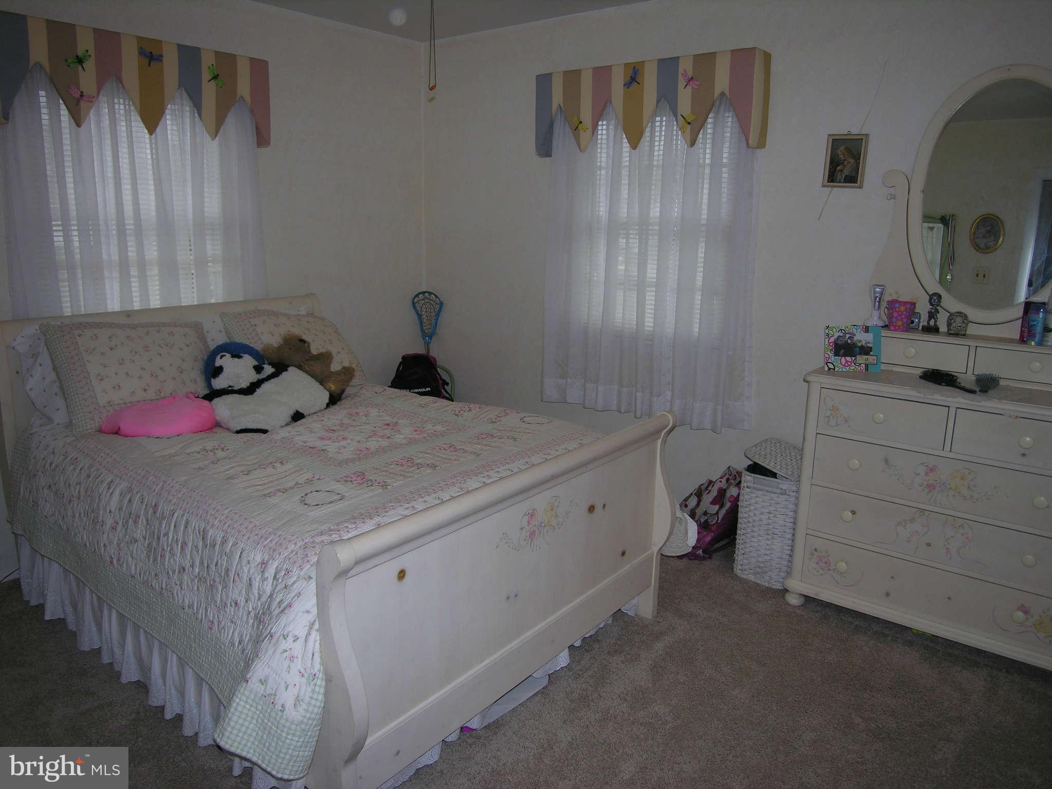 4111 Lees Corner Road Chantilly, VA 20151 - Photo 16 of 19 a bedroom with a bed and a dresser