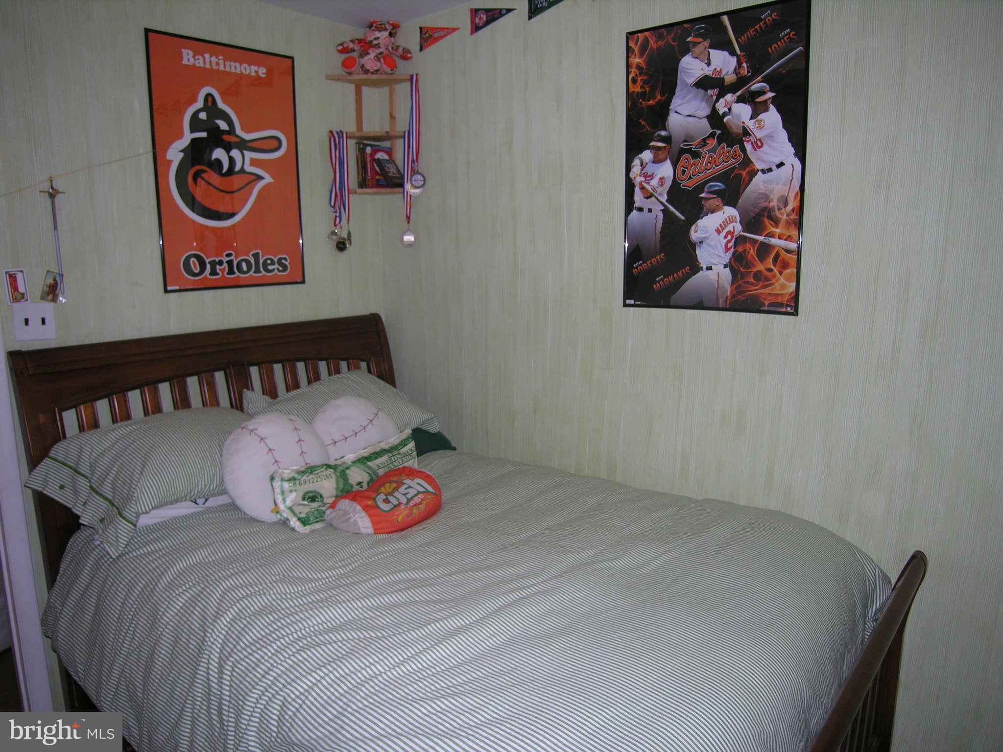4111 Lees Corner Road Chantilly, VA 20151 - Photo 19 of 19 a bedroom with a bed and painting on the wall
