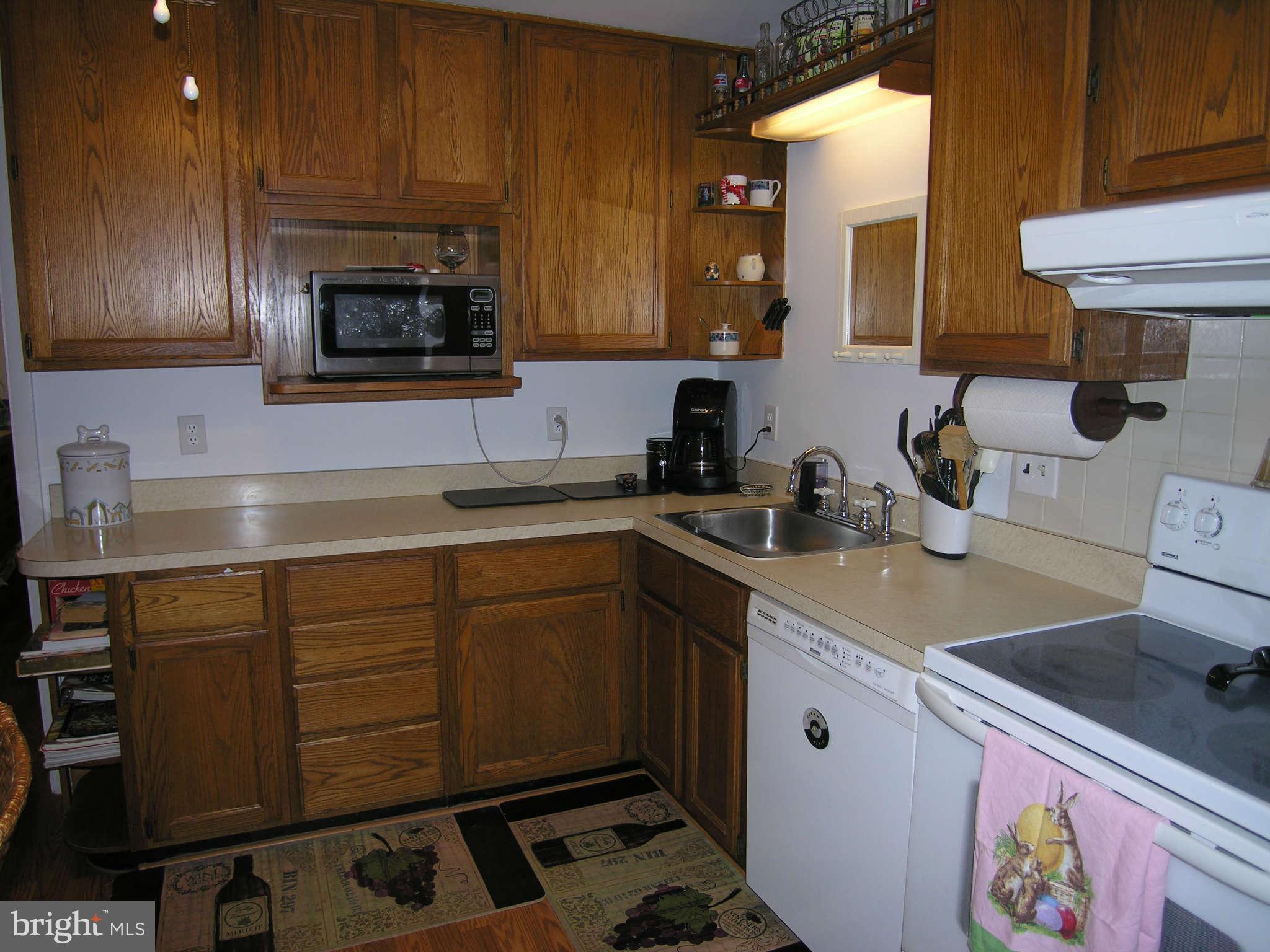4111 Lees Corner Road Chantilly, VA 20151 - Photo 6 of 19 a kitchen with a sink cabinets and appliances