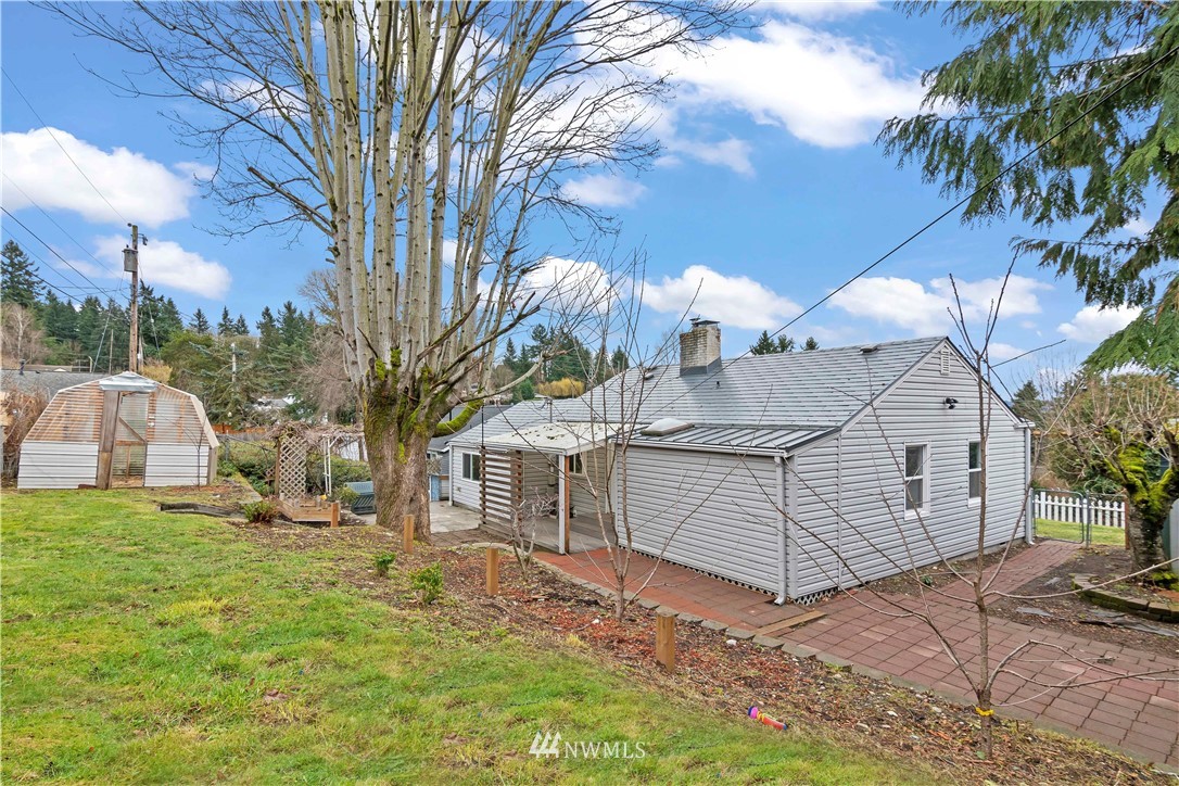 554 Bronson Way Northeast Renton, WA 98056 - Photo 26 of 35 a view of a house with a yard