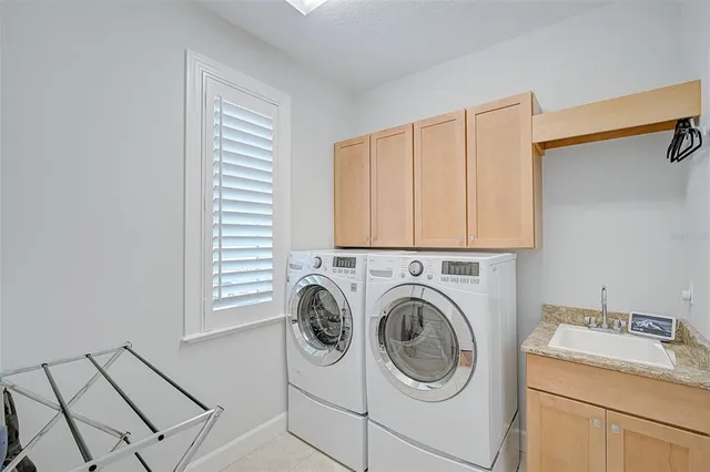 a living room with furniture and windows