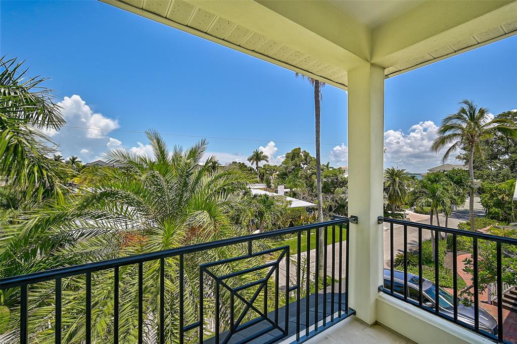 830 Tarawitt Drive Longboat Key, FL 34228 - Photo 30 of 74 a view of a balcony with a plant