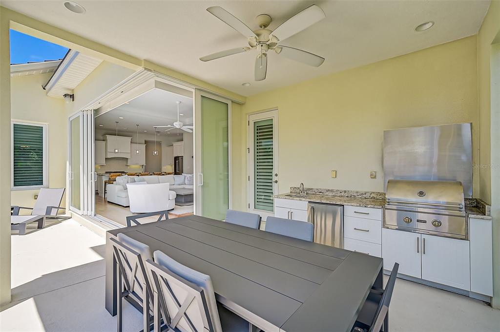 830 Tarawitt Drive Longboat Key, FL 34228 - Photo 45 of 74 a kitchen with a stove a sink and a refrigerator
