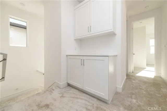 an empty room with cabinet