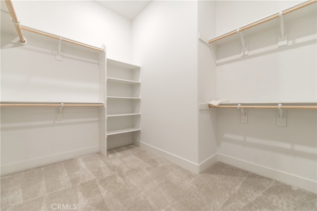 423 Flycatcher Irvine, CA 92618 - Photo 26 of 35 a view of an empty walk in closet