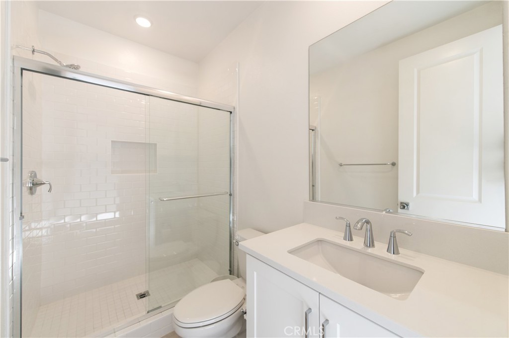 423 Flycatcher Irvine, CA 92618 - Photo 3 of 35 a bathroom with a sink toilet and shower