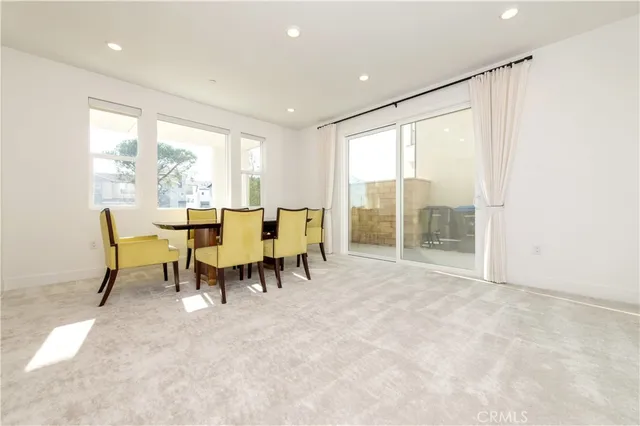 a view of work space with table and chair