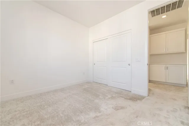 an empty room with closet