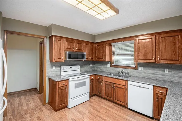 $385,000 | 14805 South Brougham Drive, Olathe, KS 66062