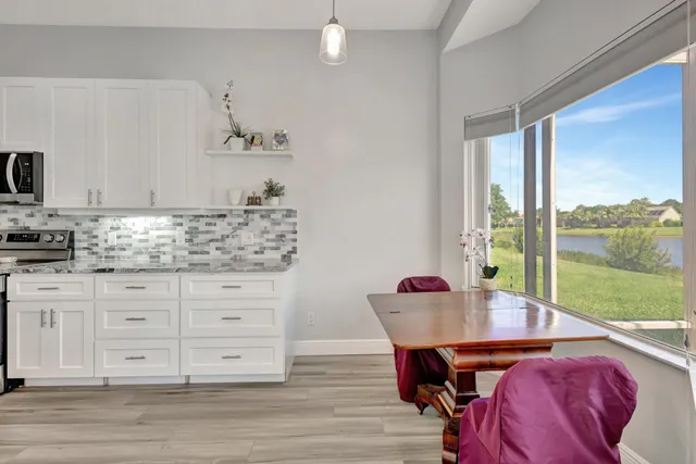 a view of living room with furniture and flat screen tv