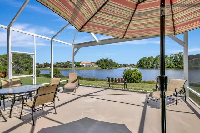 a garden view with a lake
