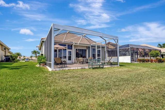 a bedroom with a bed and cabinets