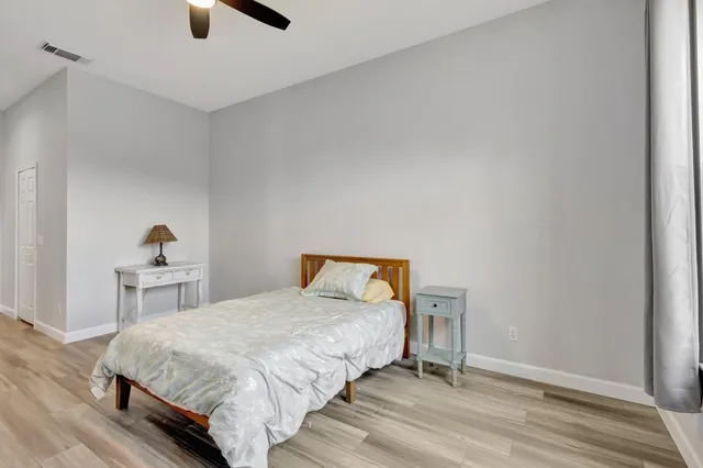 a bathroom with a double vanity sink mirror and double