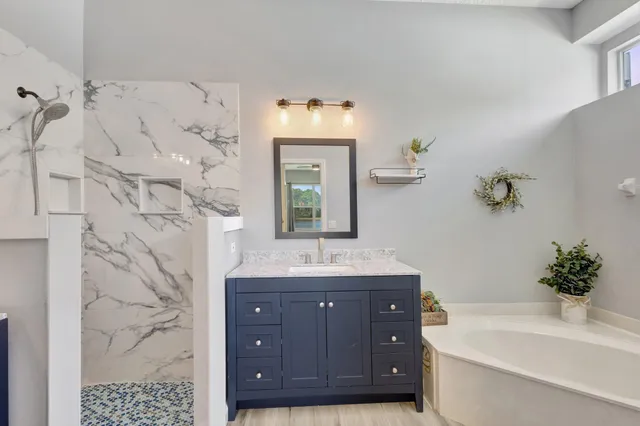 a view of an entryway with wooden floor