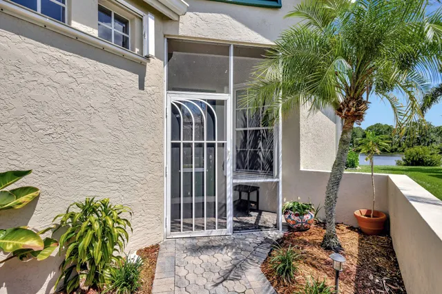 a backyard of a house with seating space