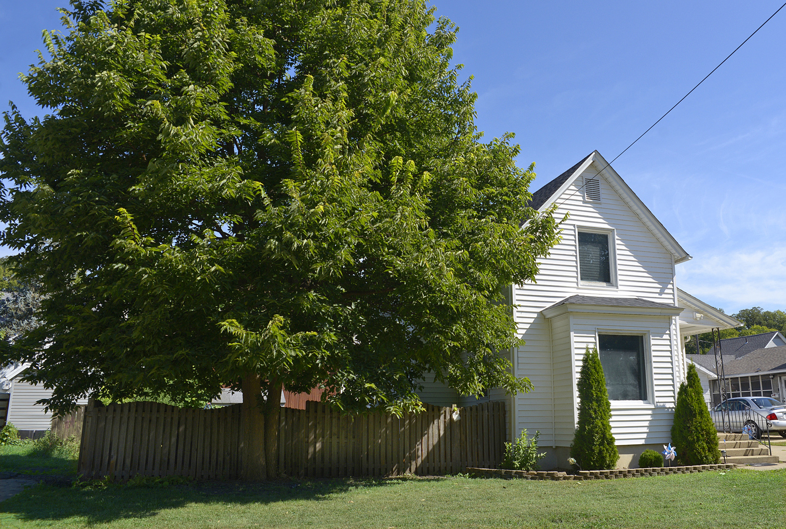 454 Washington Street Marseilles, IL 61341 - Photo 14 of 16 a front view of a house with a garden