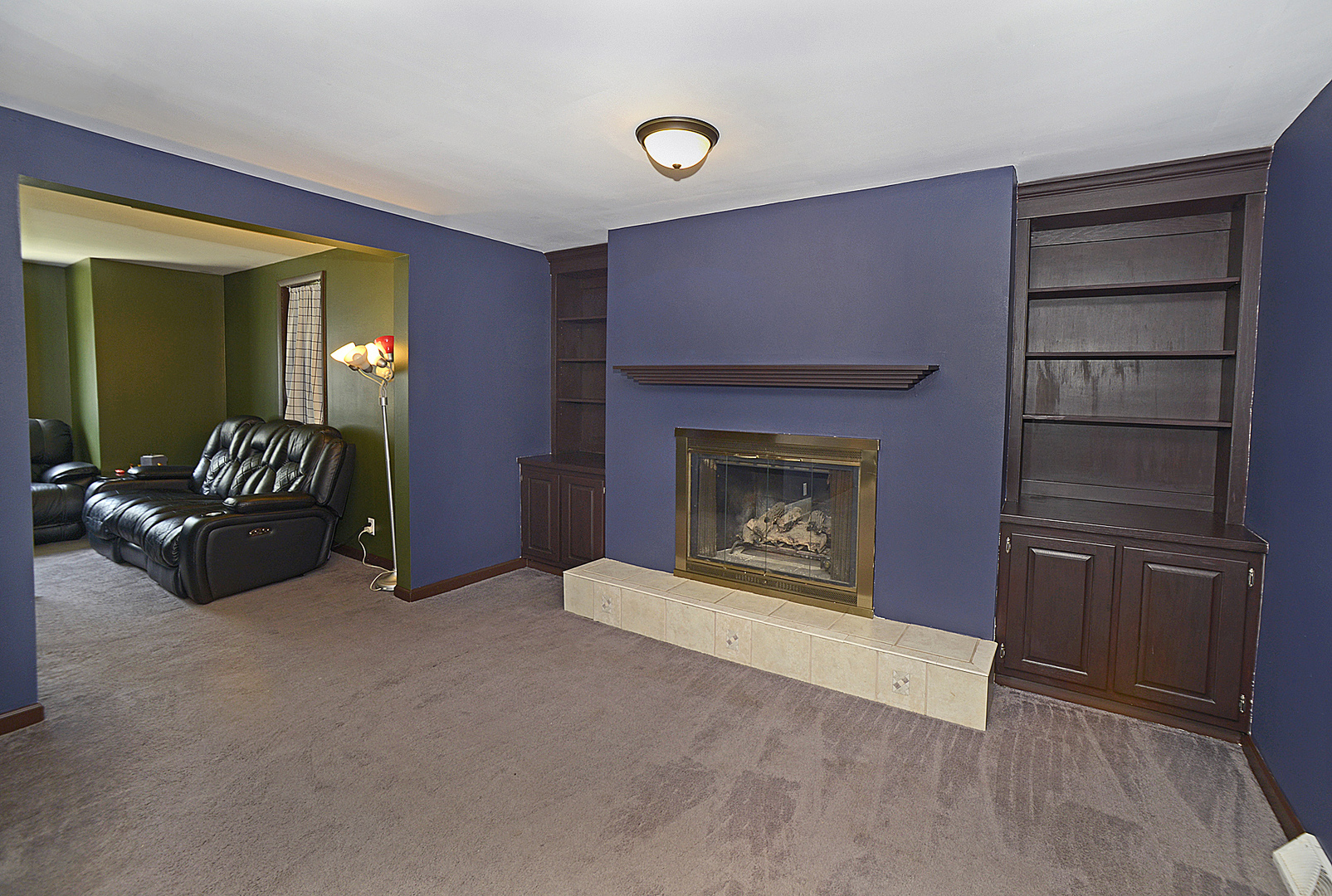 454 Washington Street Marseilles, IL 61341 - Photo 6 of 16 a living room with furniture and a fireplace