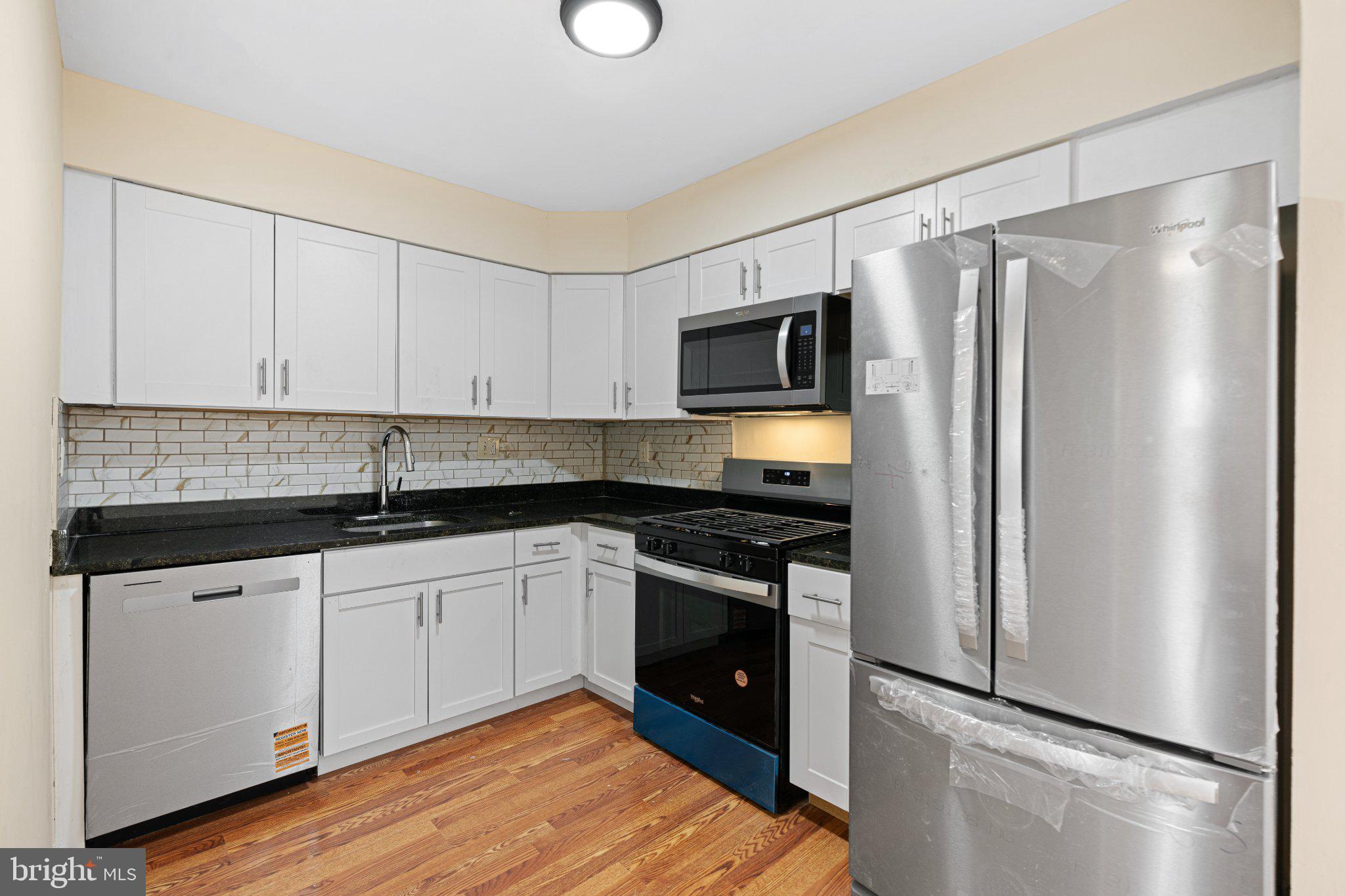 3281 Red Lion Road, Unit 2 Philadelphia, PA 19114 - Photo 5 of 15 Modern kitchen with sleek finishes.