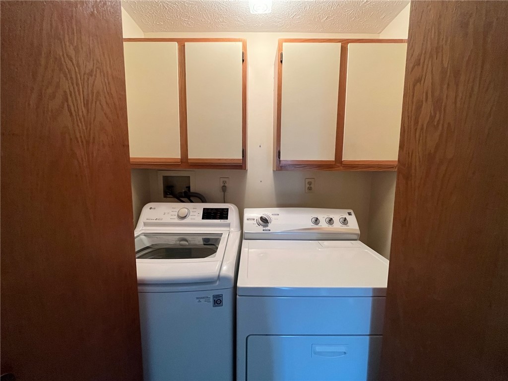 5 Daisy Lane Chili, NY 14514 - Photo 13 of 20 1st floor laundry off entry hallway for easy conve