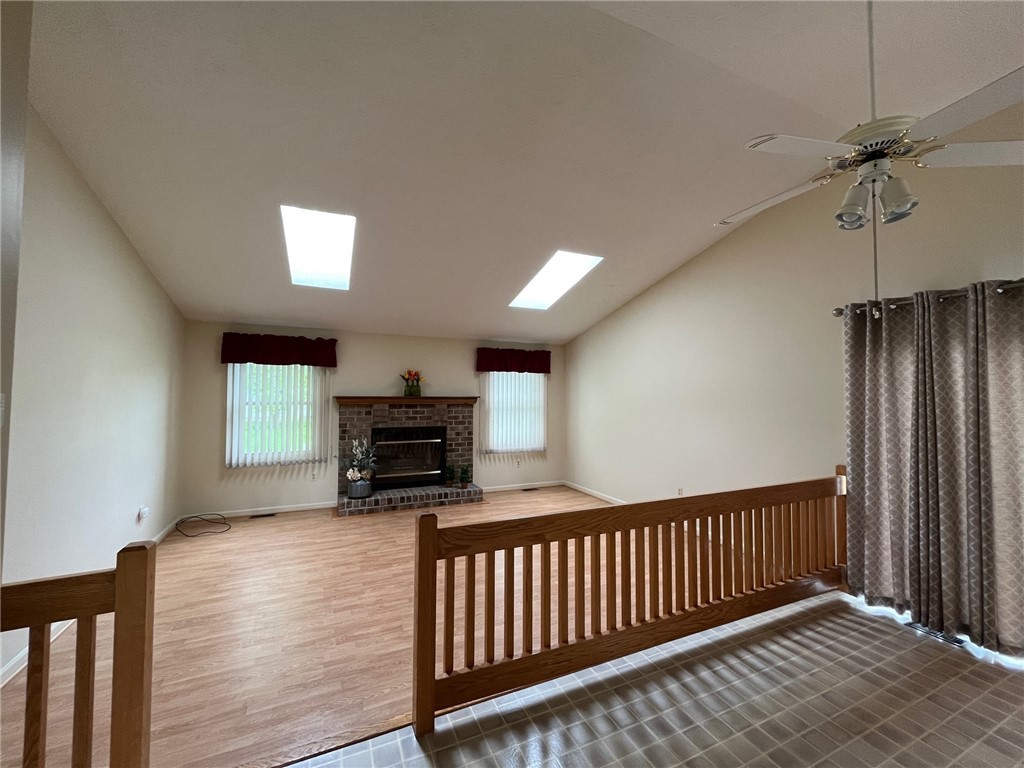 5 Daisy Lane Chili, NY 14514 - Photo 5 of 20 Generous great room with cathedral ceiling and sky