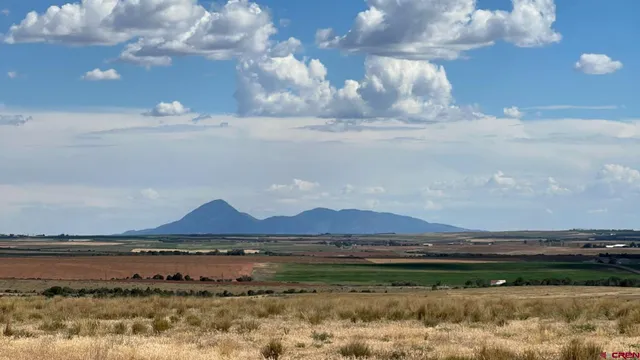a view of lake with mountain