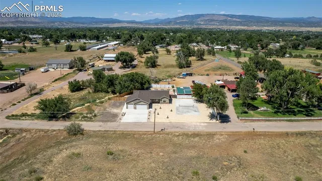 a view of a street with a building in the background