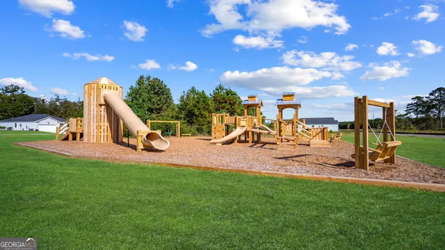 a view of a park with swings