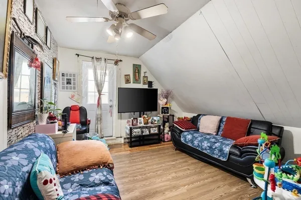 a bed room with a bed and a couch